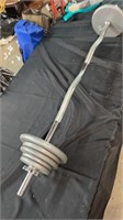 Weightlifting bar with 50lbs of weights