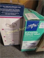 2 medical toilet seats raised