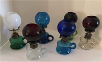 Six assorted miniature finger oil lamps w ball sh