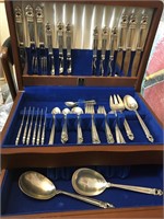 International chest of 64 pcs of sterling silver