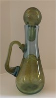 Demaine art glass handled decanter with stopper.