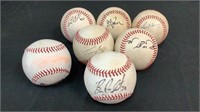7 autographed baseballs