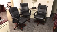 3 LEATHER OFFICE CHAIRS ON WHEELS