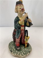 Vintage porcelain clown playing flute