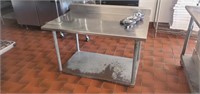 Stainless Steel Table with back splash and casters