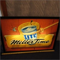 Lighted Miller Time Lite Beer sign.