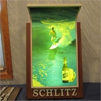 1967 lighted Schlitz surfer beer sign.
