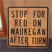 Stop for red on Waukegan metal sign.