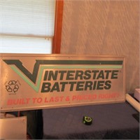 Interstate Batteries metal sign.