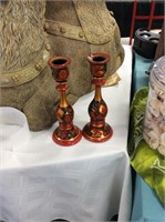 Two decorative candleholders