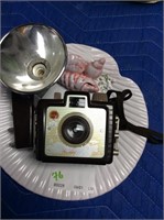 Vintage camera on shell dish