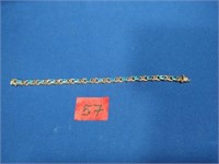10kt  Gold Bracelet with Blue Gem Stones
