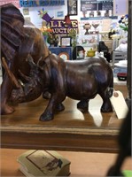 Wooden rhino statue