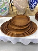Set of six stackable wooden trays