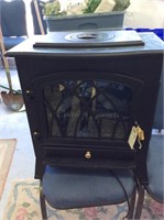 Electric faux wood burning heater stove