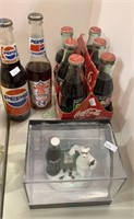 Collector Pepsi and Coca-Cola bottles still