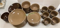 Set of chocolate brown china includes 12 dinner