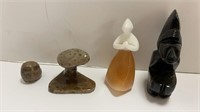 Hand carved stone figurines