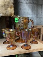 CARNIVAL GLASS PITCHER AND GLASSES