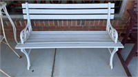 Wooden bench w/ wrought iron arms