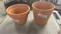 1- 7.5inch flair cylinder clay pot and 1- 8 inch