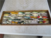 COLLECTION OF (35) BOMBER LURES IN WOOD CASE