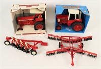 Two International Die Cast Tractors & Equipment