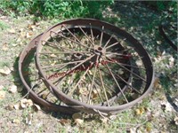 2 iron tractor wheels 47"