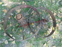 2 iron wagon wheels 28"