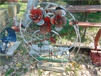 2 wagon wheel & flower yard art (HEAVY) SEE PICS -