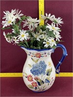 large ceramic pitcher and flowers