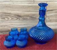 Blue glass decanter with 6 glasses