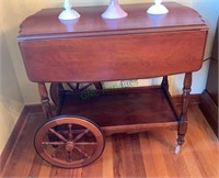 Solid wood tea cart with two dropleaf sides,