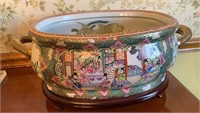 Large Chinese oval 2 handle bowl on a wooden