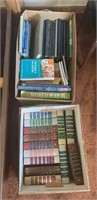 Two boxes of books including 11 year books - The