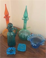 6 pieces of colored glass, two small blue glass