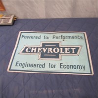 Metal Chevrolet economy sign.