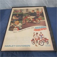 Framed Harley Davidson motorcycle ad.