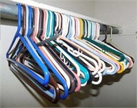 Several plastic tube hangers and others