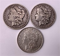3 - 1891 silver dollars, one O mint
