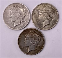 3 silver dollars 1935O, two 1935 (no mark)