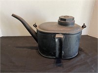 Antique oil can