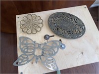 Collection of Three Metal Decorative Trivets