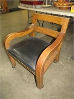 ANTIQUE OAK ARMED LEATHER SEATEE ROLLING CHAIR