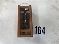 Vintage kid's microscope in wood case