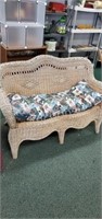 Forever wicker patio bench with wildlife-themed