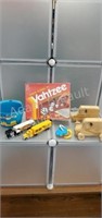 Assorted children's toys - wood toy trucks,