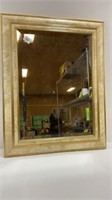 Wall mirror with gold frame