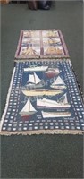 2 decorative sailboat throw blankets, both have