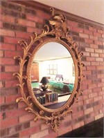 GOLD FRAMED OVAL MIRROR WITH EAGLE ON TOP -